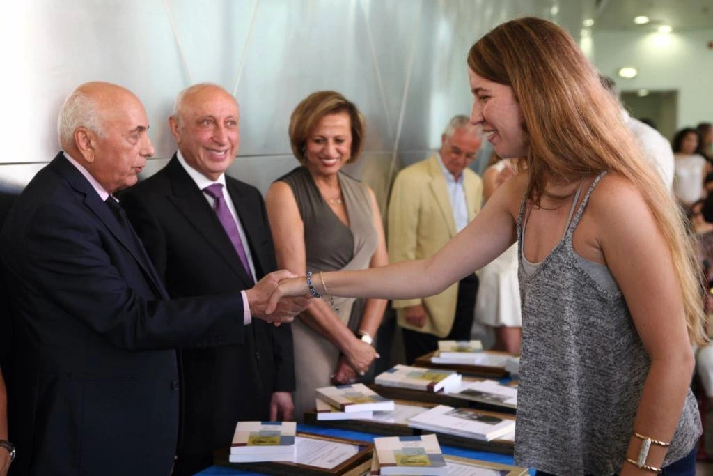 Awarding scholarships at the Maccabim Foundation ceremony